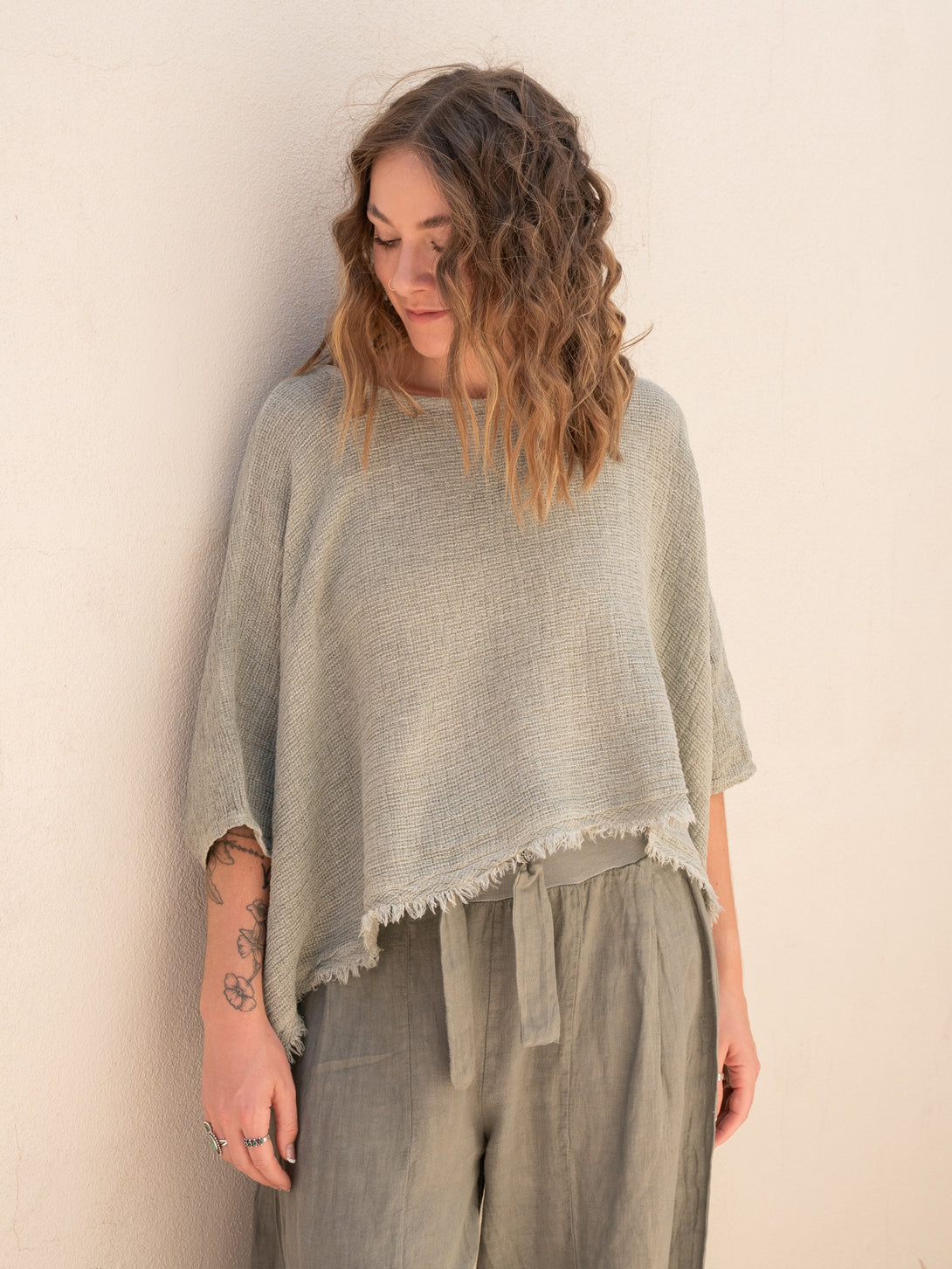 Conscious Coterie Bondi Linen Top in Olive on model front view