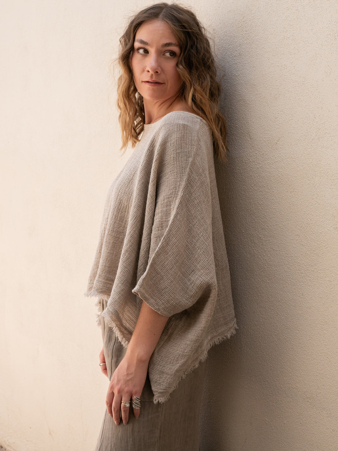 Conscious Coterie Bondi Linen Top in Taupe on model side view