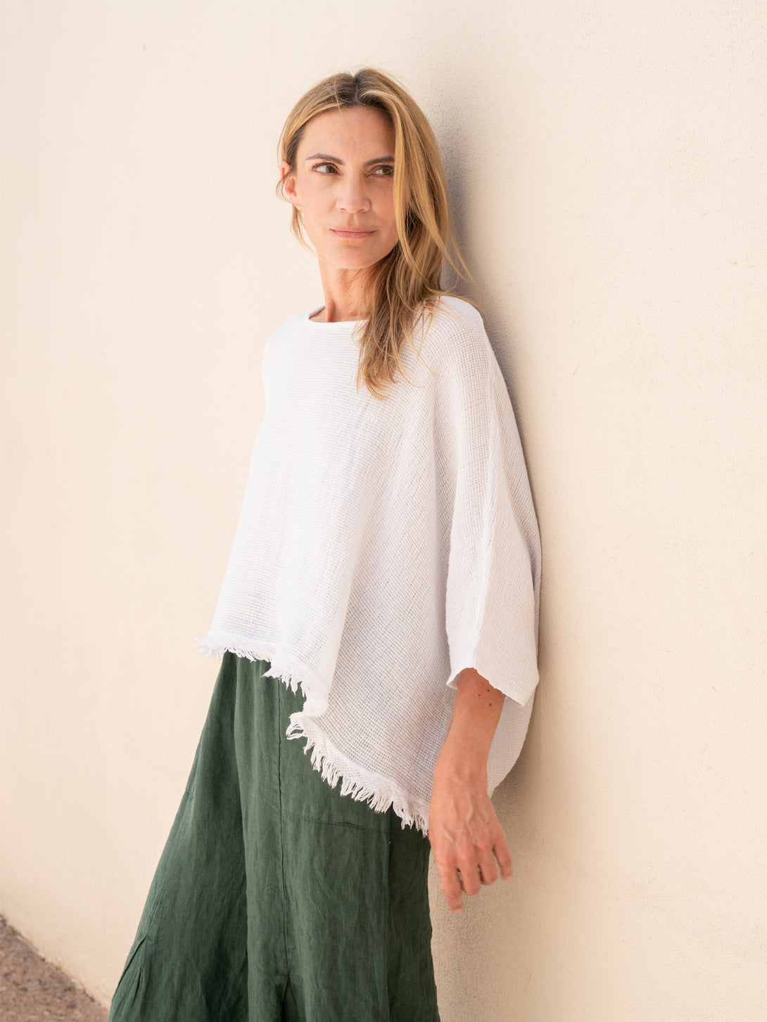 Conscious Coterie Bondi Linen Top in White on model front view