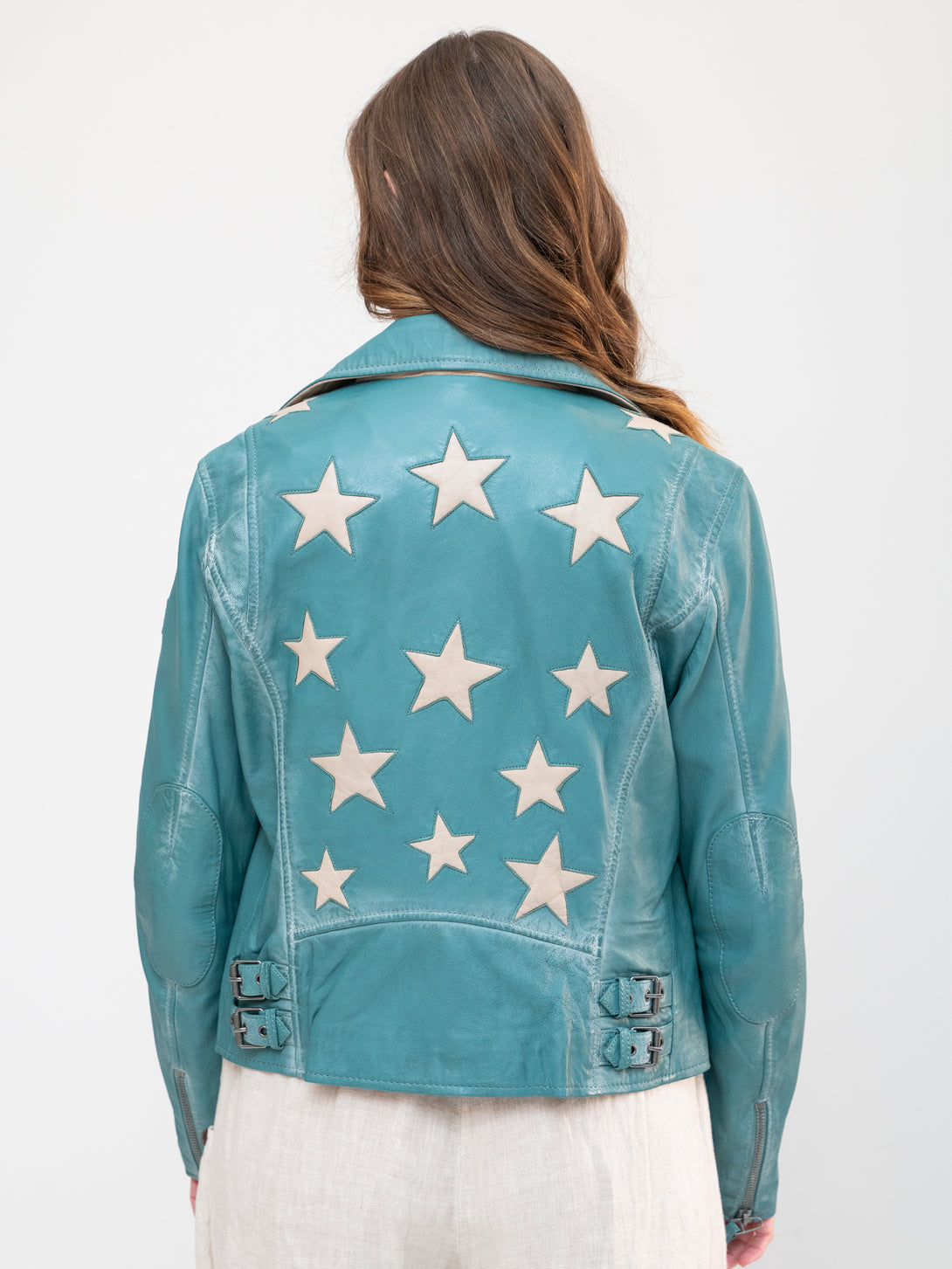 Conscious Coterie Christy Star Leather Jacket in sea green on model back view