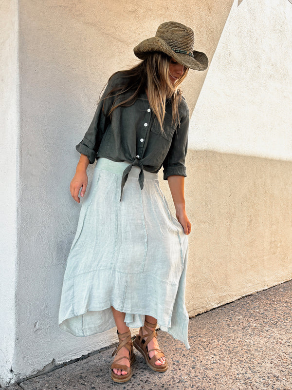 Conscious Coterie Dana Skirt in Olive on model looking down full front view