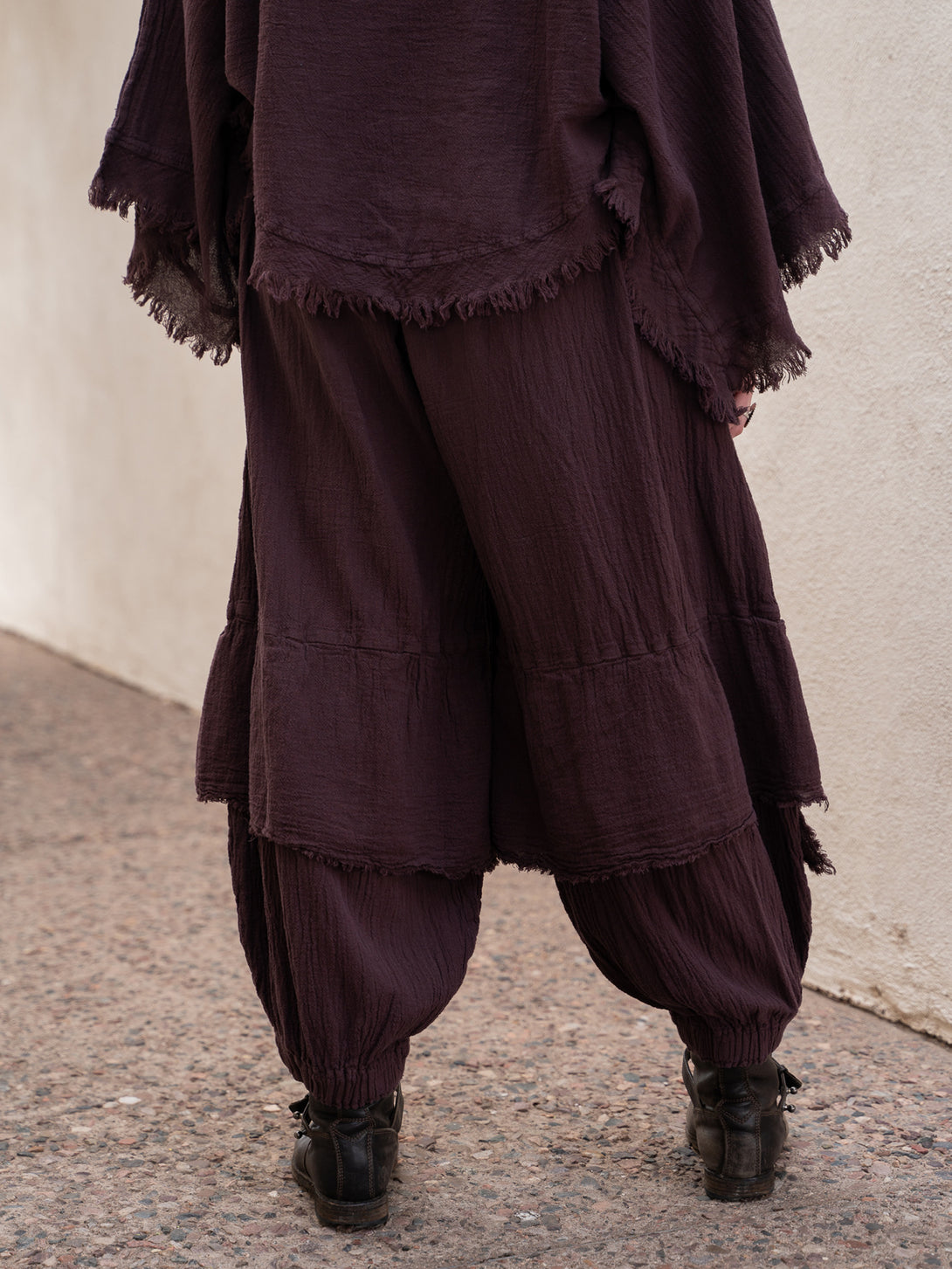 Conscious Coterie Dolly Pant in eggplant cotton on model back view