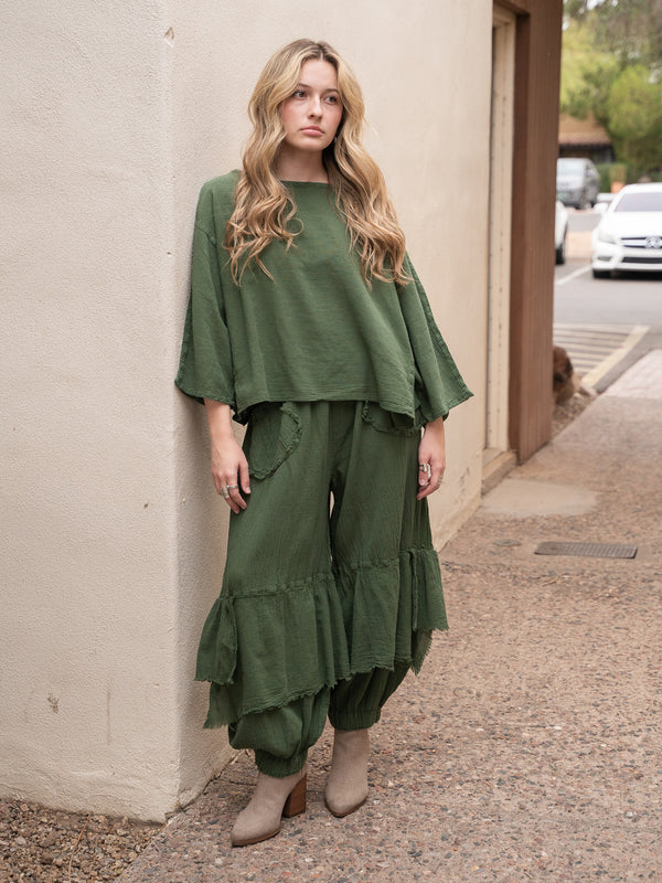 Conscious Coterie Dolly Pant in moss cotton on model full front view