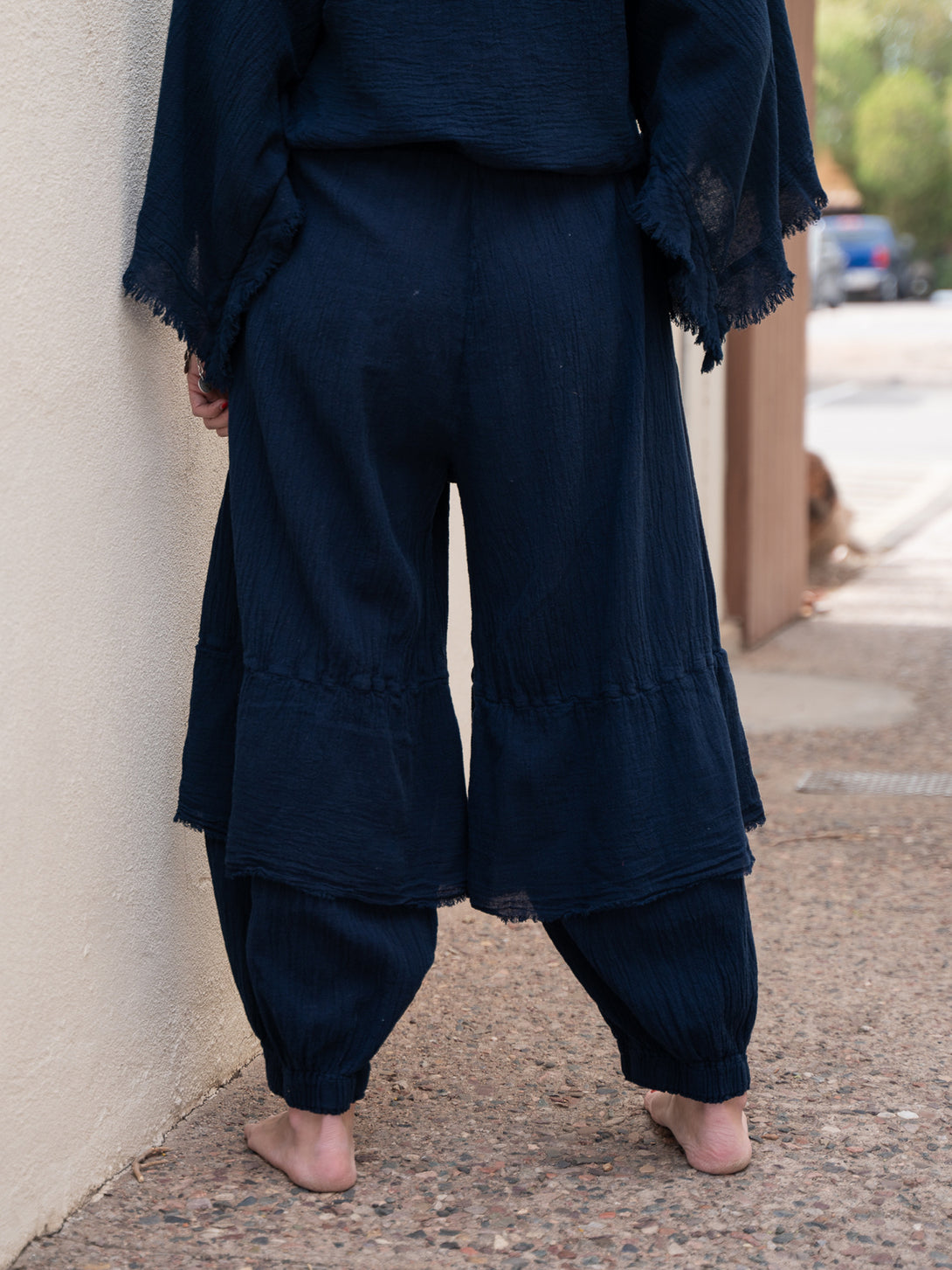 Conscious Coterie Dolly Pant in navy cotton on model back view