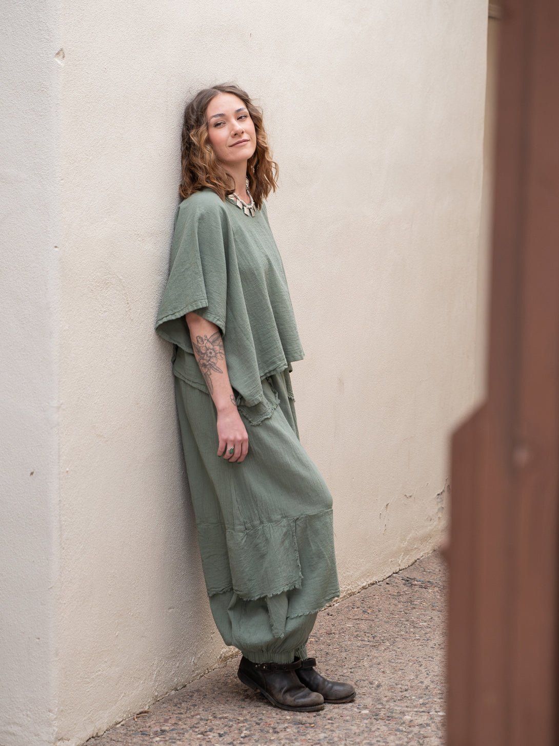 Conscious Coterie Dolly Pant in sage cotton on model full front side view