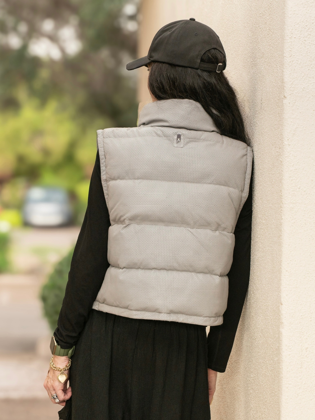 Conscious Coterie Ellice leather vest in light blue close up back view of puffer vest