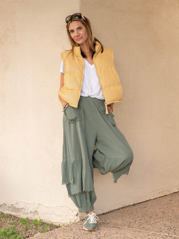 Conscious Coterie Ellice leather vest in light yellow full body image on model front view