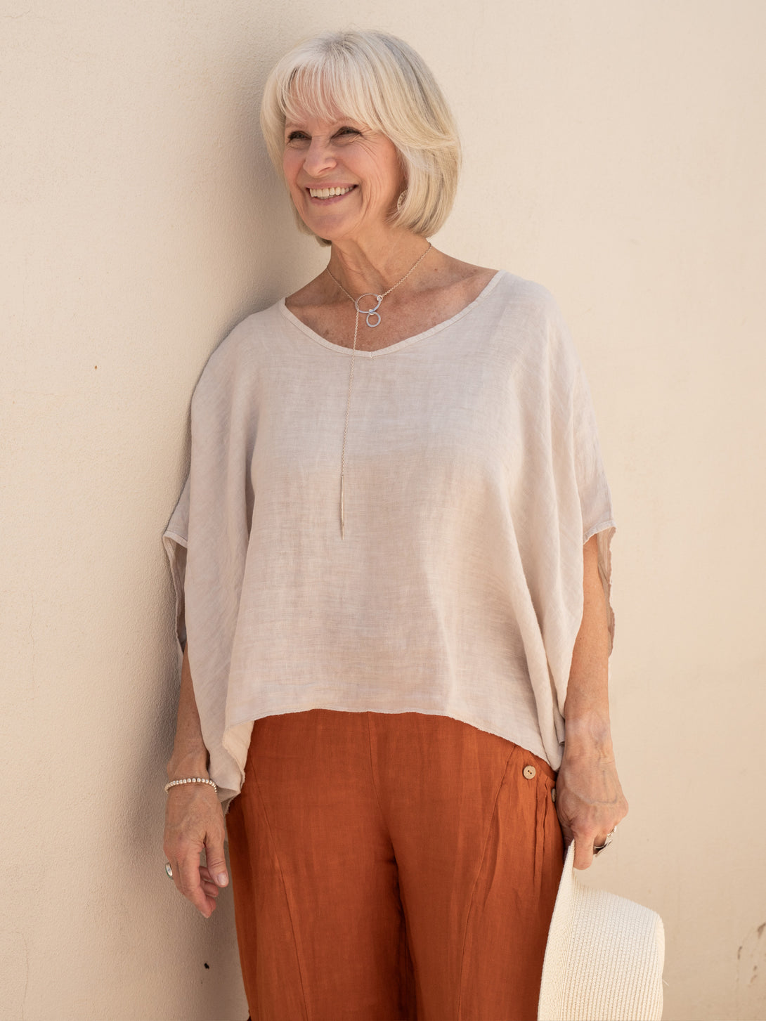 Conscious Coterie Felice Linen Top in beige on model front view
