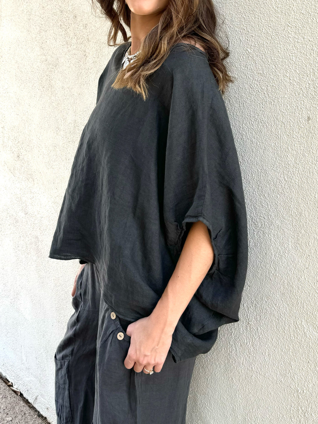 Conscious Coterie Felice Top in Charcoal on model side view