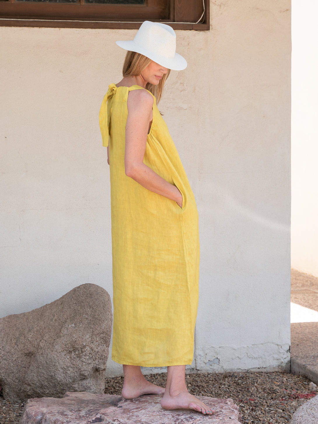 Conscious Coterie Jill Linen Dress in Mustard on model full side view