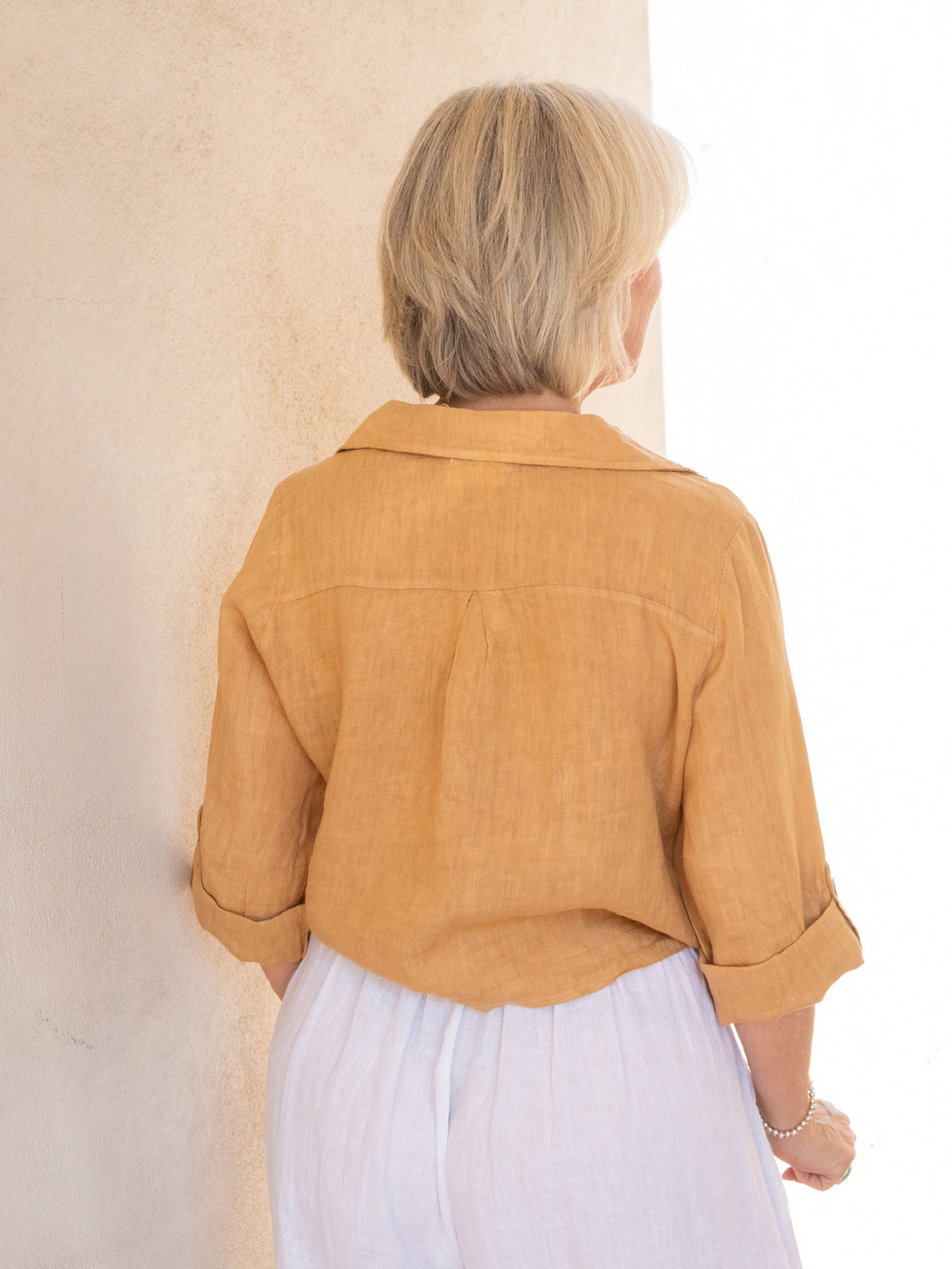 Conscious Coterie Jodi Linen Top in Camel on model back view