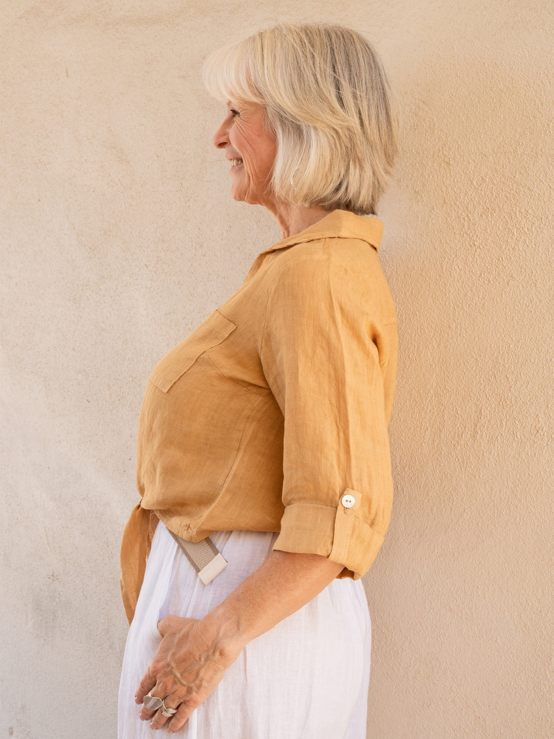 Conscious Coterie Jodi Linen Top in Camel on model side view