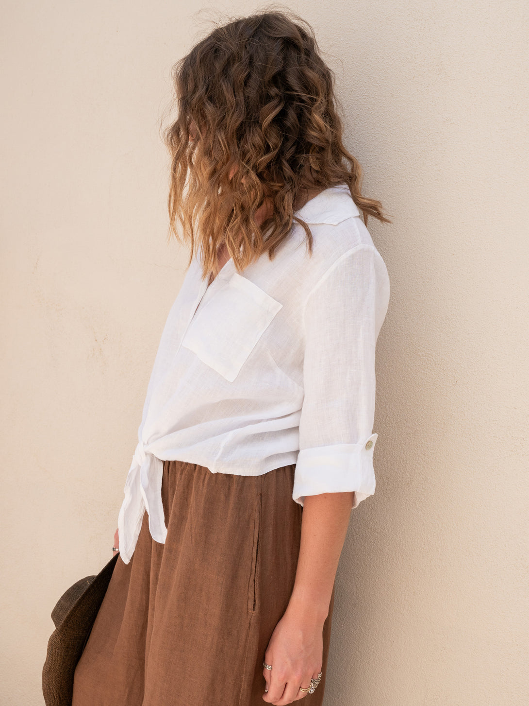 Conscious Coterie Jodi Linen Top in White on model side view