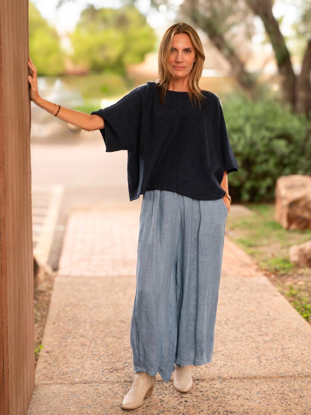 Conscious Coterie Katie Short Sleeve Sweater in navy on model full front view