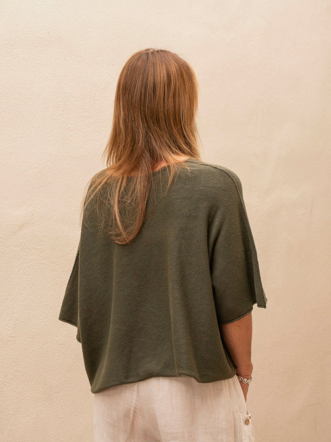 Conscious Coterie Katie Short Sleeve Sweater in olive on model back view