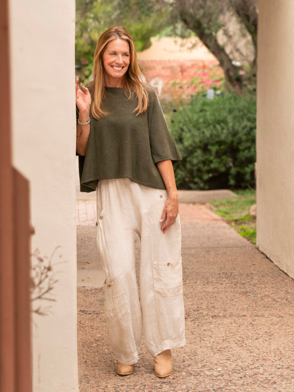 Conscious Coterie Katie Short Sleeve Sweater in olive on model full front view