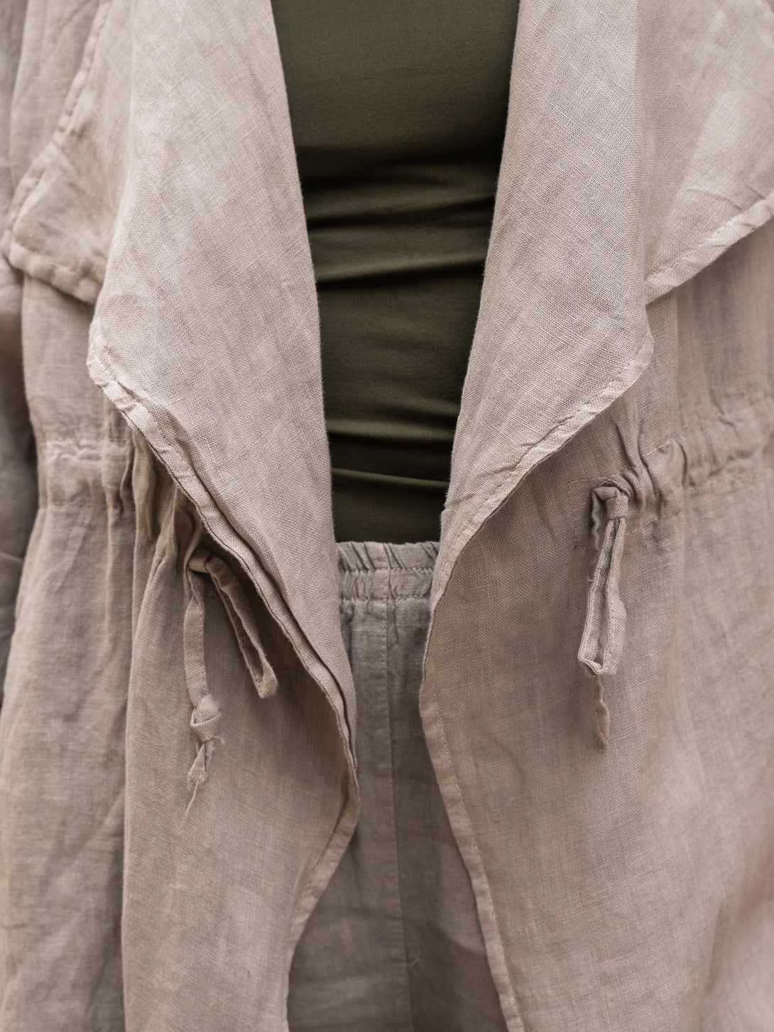 Conscious Coterie Lany Linen Cardigan in taupe on model front detail view