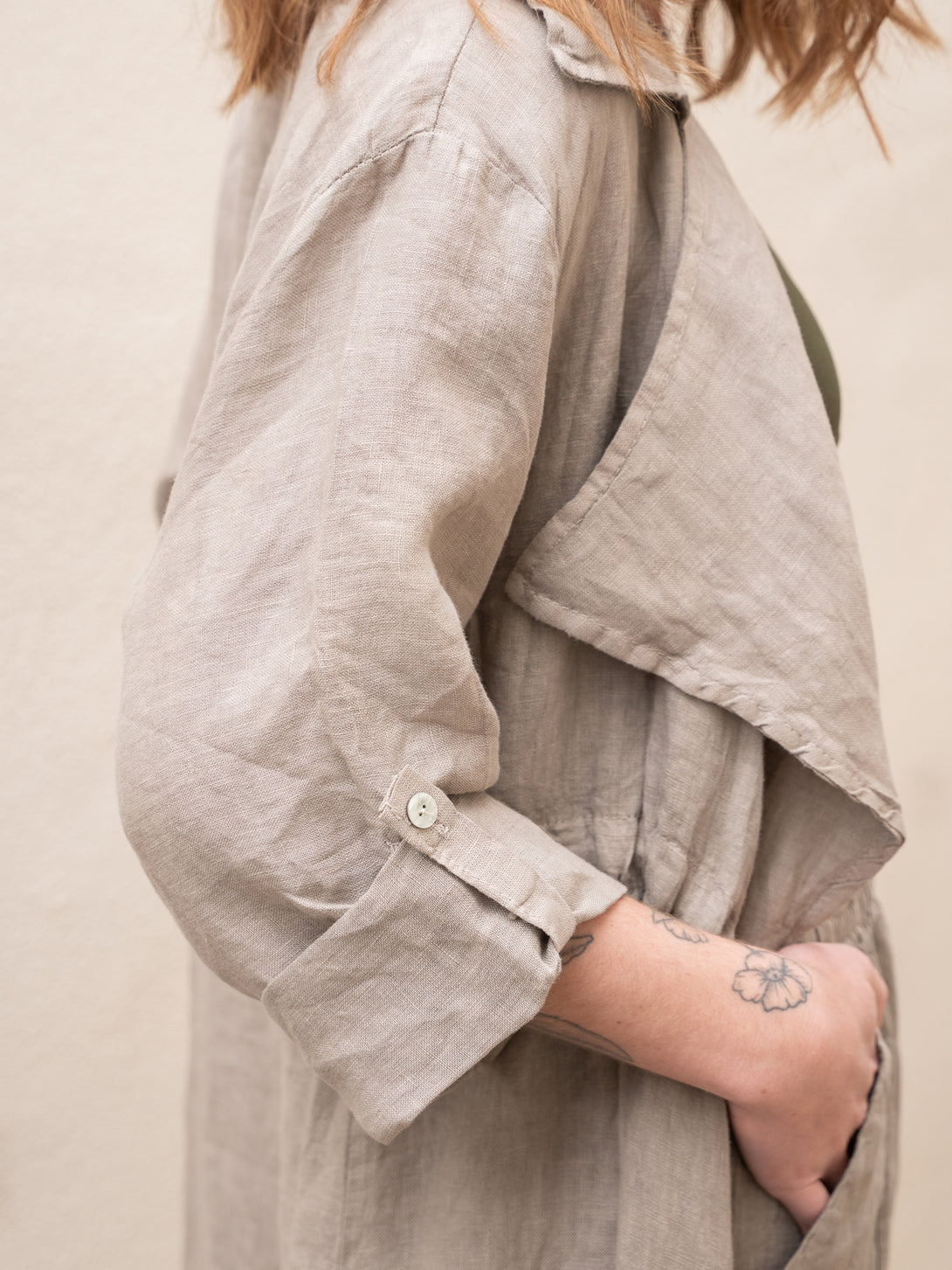Conscious Coterie Lany Linen Cardigan in taupe on model side detail view