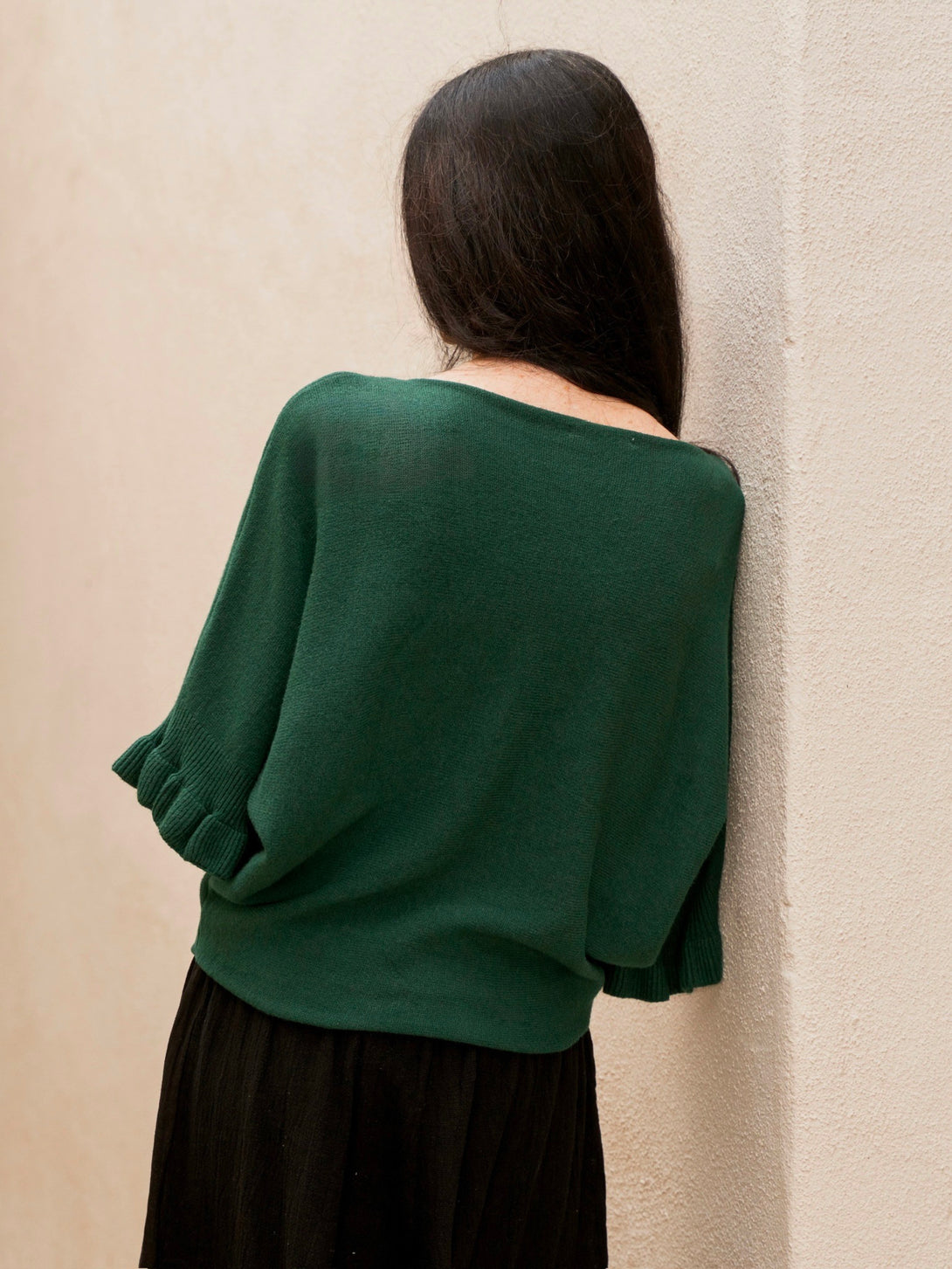 Conscious Coterie Lila Ruffle Sleeve Sweater in forest green on model back view