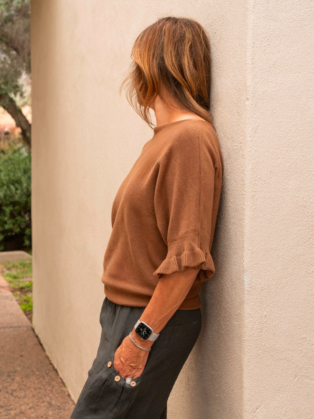 Conscious Coterie Lila Ruffle Sleeve Sweater in tobacco on model side view