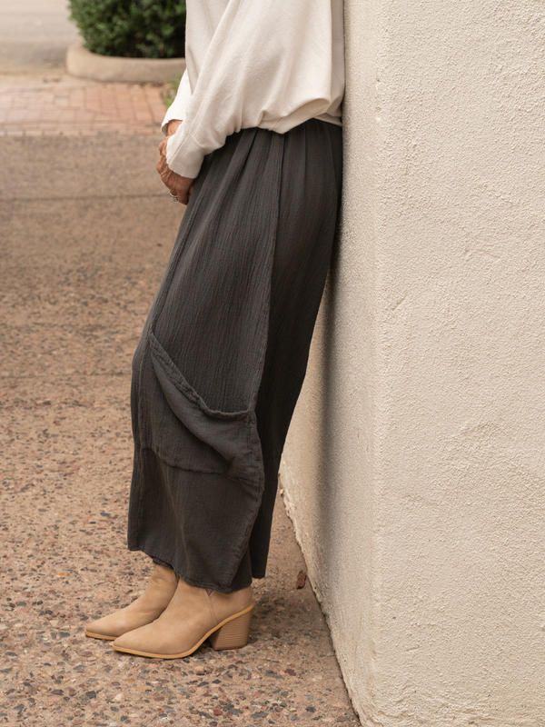 Conscious Coterie Lucy pant in charcoal grey close up side view of pants