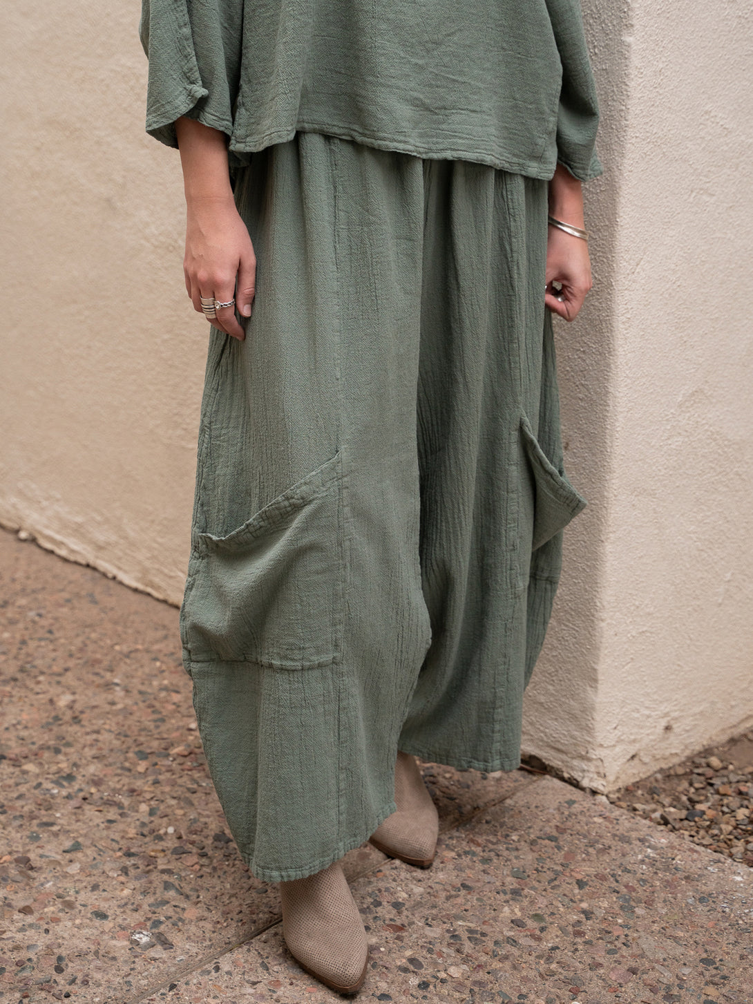 Conscious Coterie Lucy Pant in sage cotton on model front view