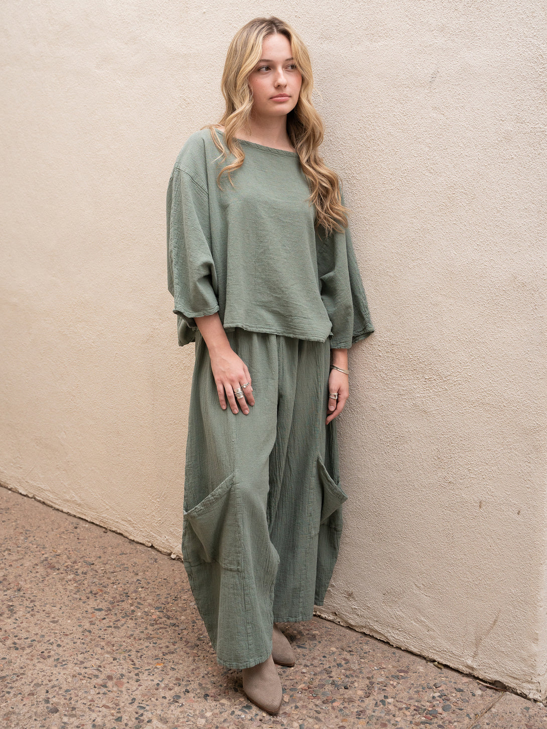 Conscious Coterie Lucy Pant in sage cotton on model full front side view