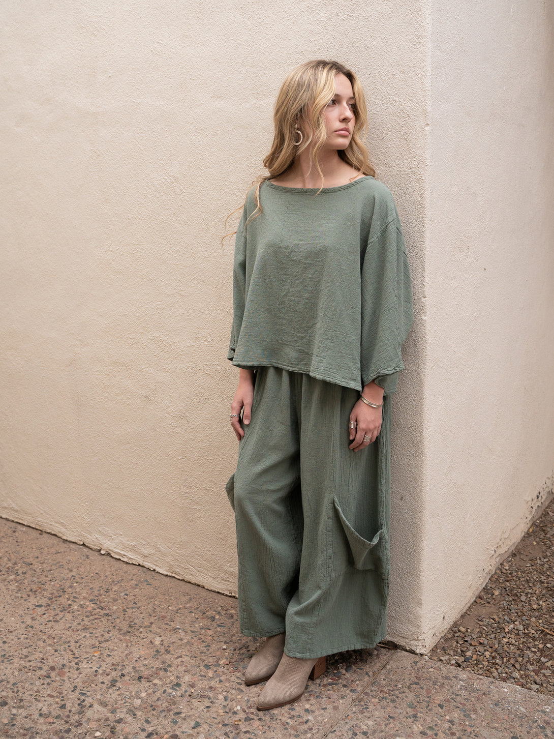 Conscious Coterie Lucy Pant in sage cotton on model looking left full front view