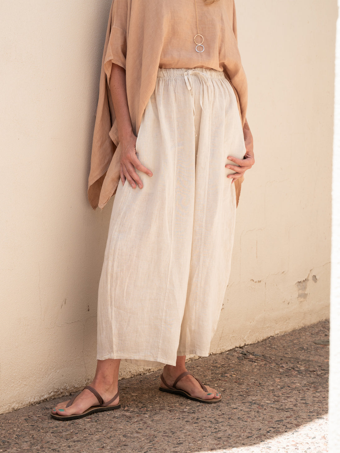 Conscious Coterie Mel Linen Pant in Beige on model front view