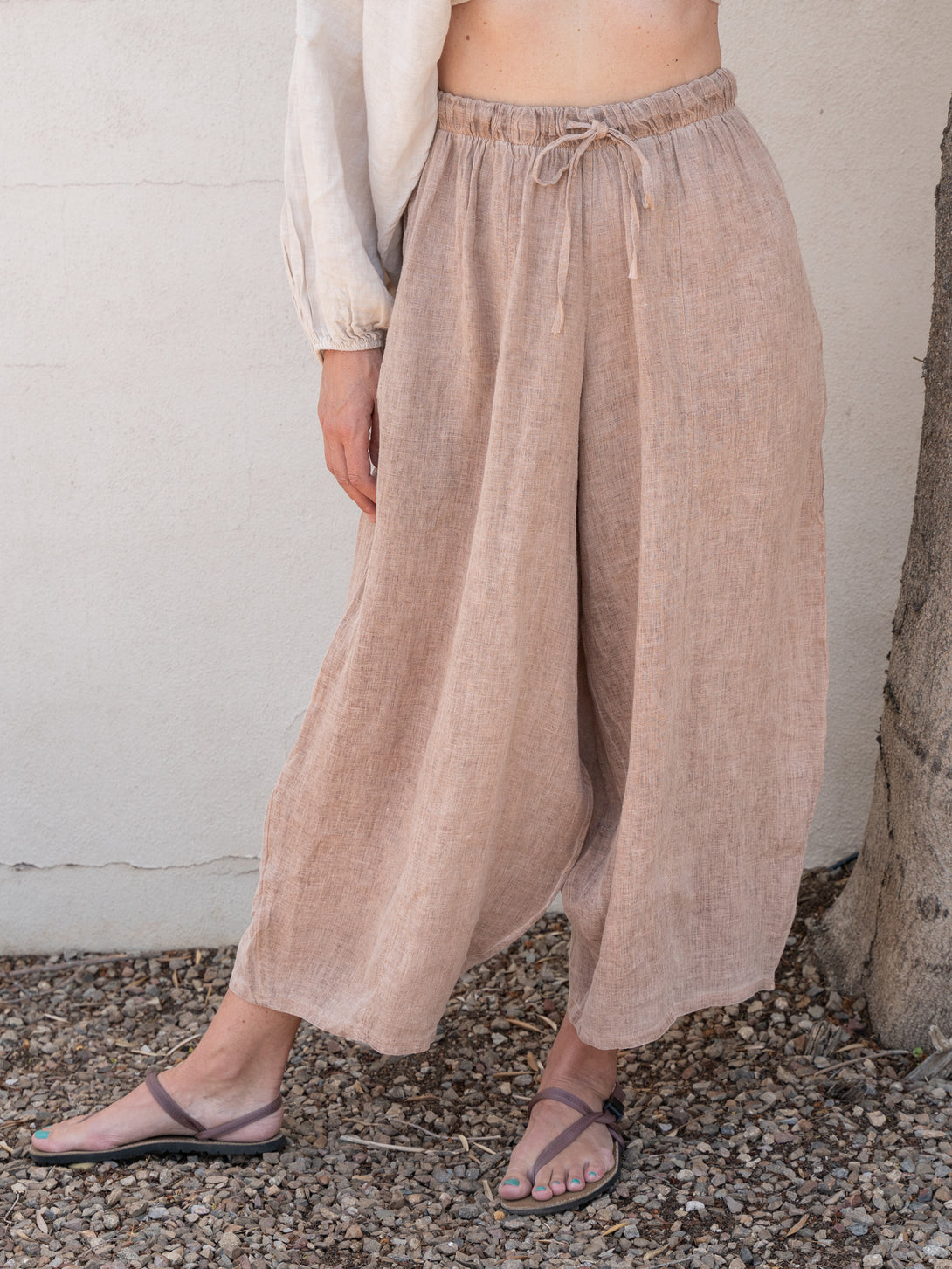 Conscious Coterie Mel Linen Pant in Brown on model alternate front view