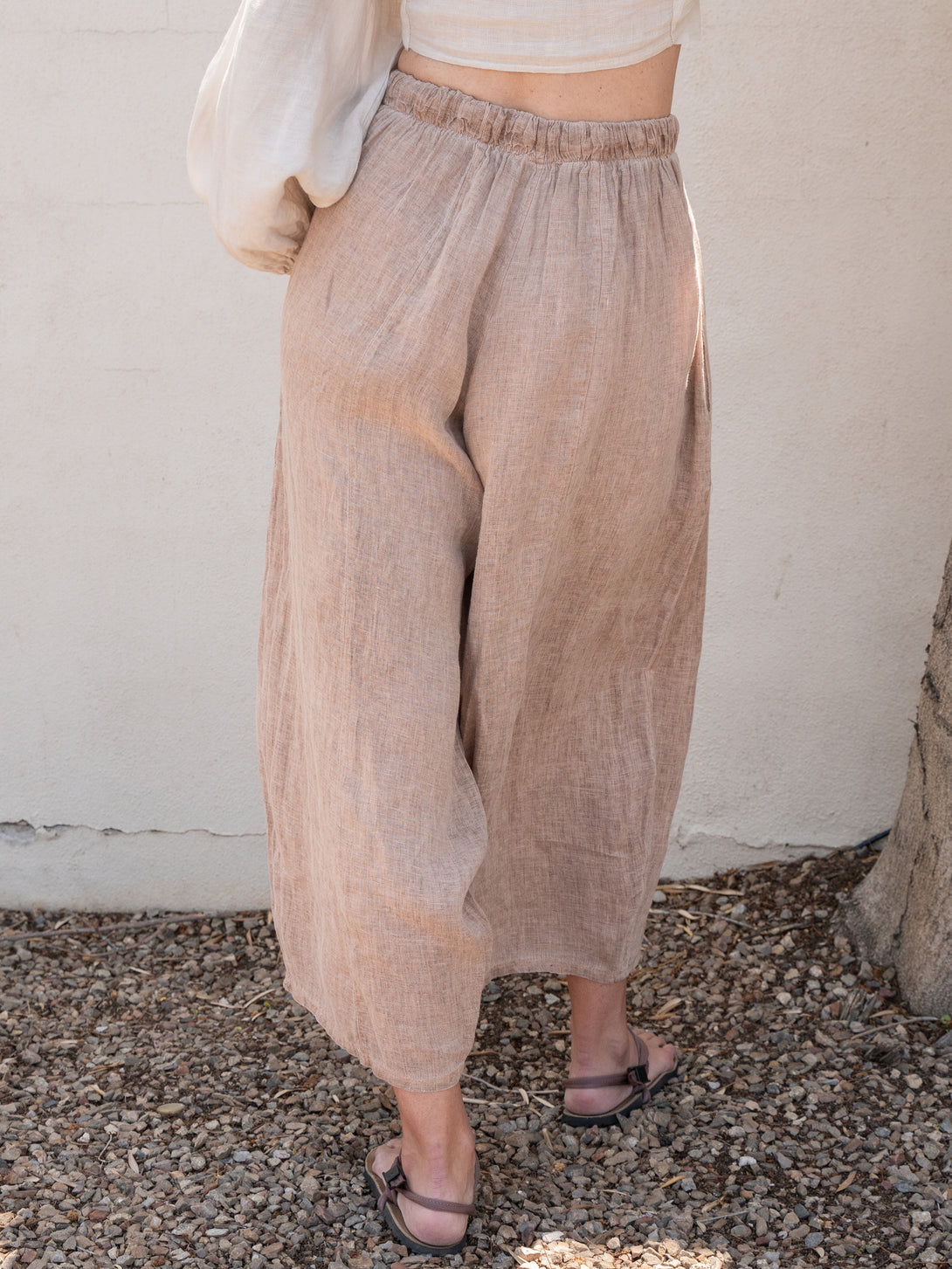 Conscious Coterie Mel Linen Pant in Brown on model back view