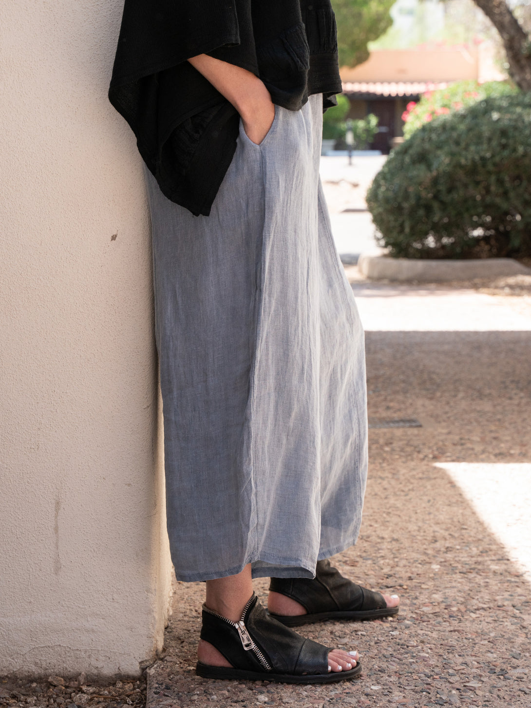 Conscious Coterie Mel Linen Pant in Navy on model side view