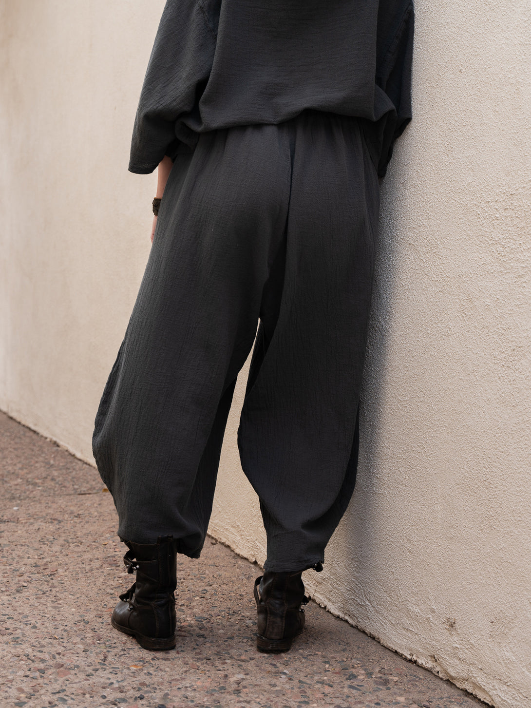Conscious Coterie Mickey Pant in charcoal cotton on model back bottom view