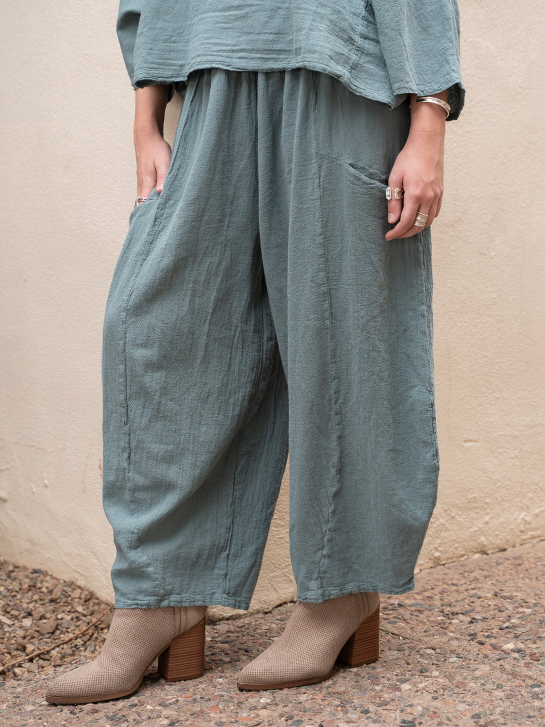 Conscious Coterie Mickey Pant in sea cotton on model front bottom view