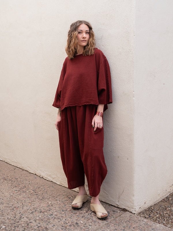 Conscious Coterie Mickey Pant in wine cotton on model full front view