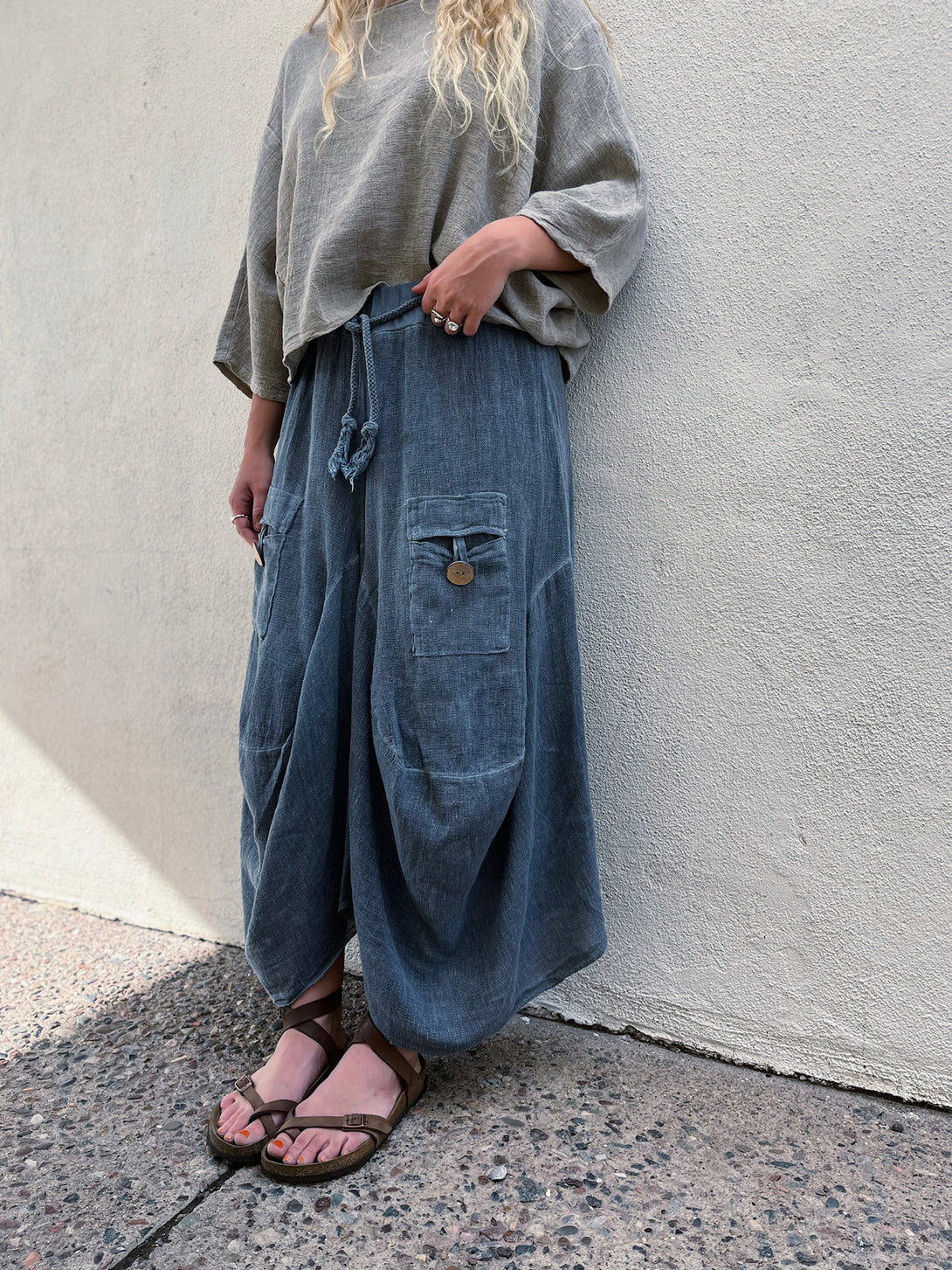 Conscious Coterie Quincy Skirt in Navy on model side view