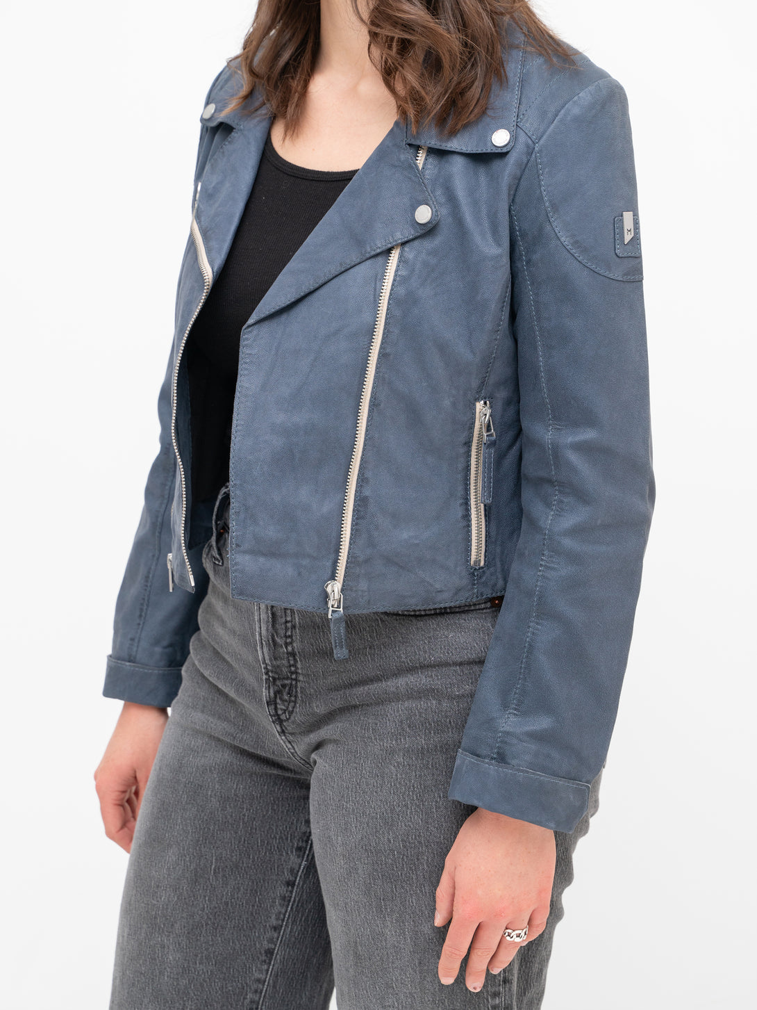 Conscious Coterie Reanon Leather Jacket in blue on model front side view