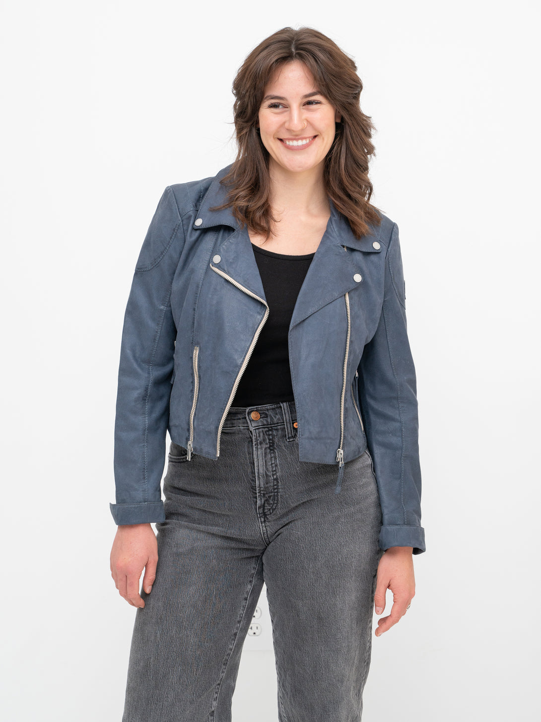 Conscious Coterie Reanon Leather Jacket in blue on model smiling front view