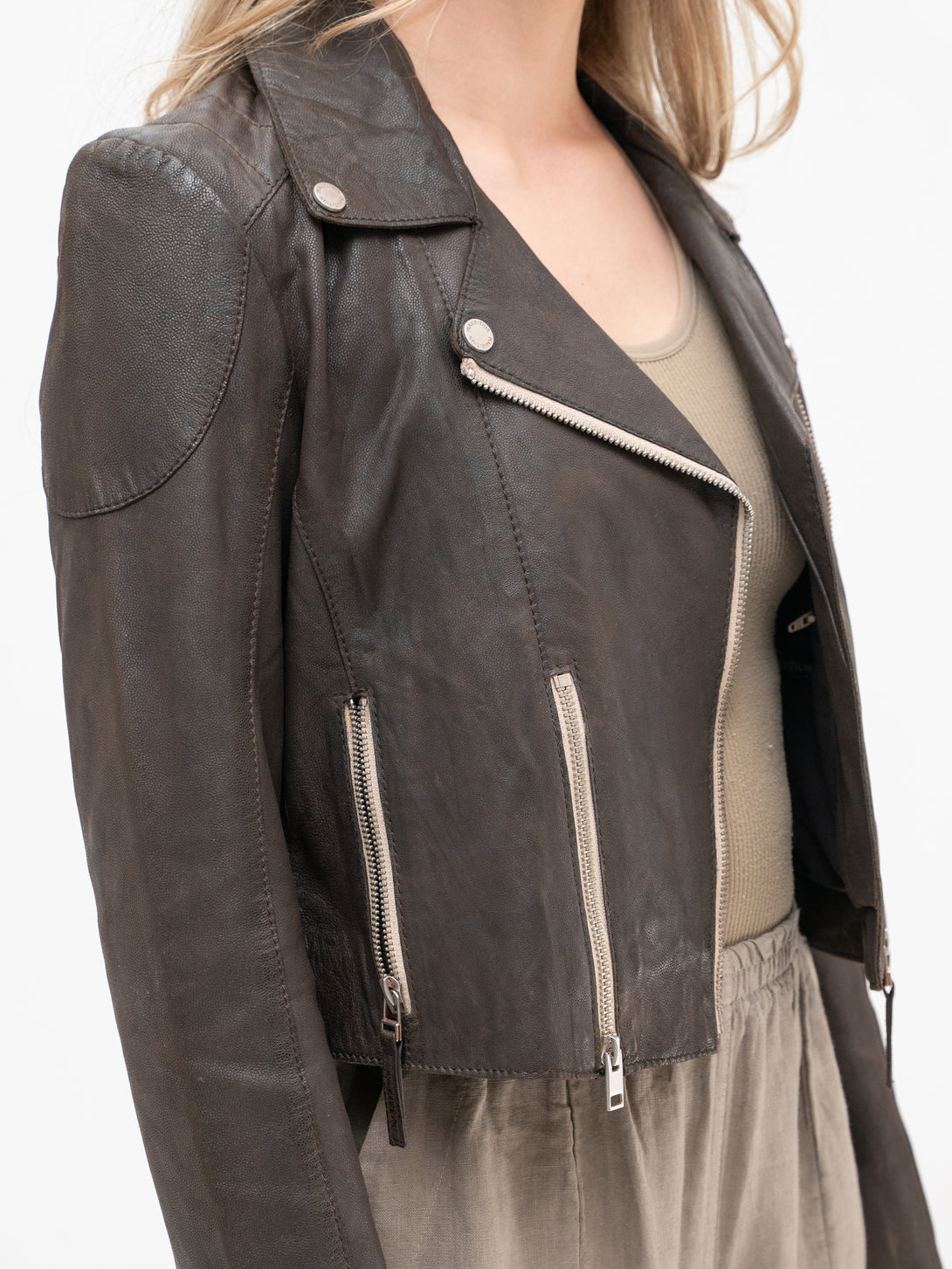 Conscious Coterie Reanon Leather Jacket in brown on model side view