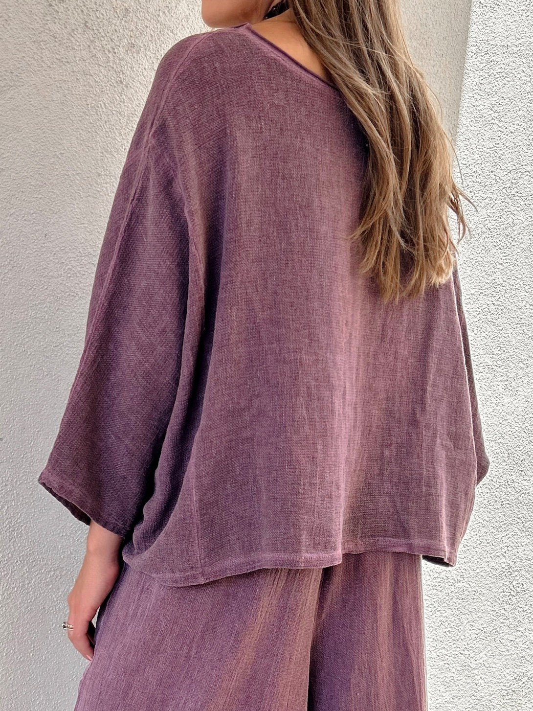 Conscious Coterie Rhonda Top in Plum on model back view