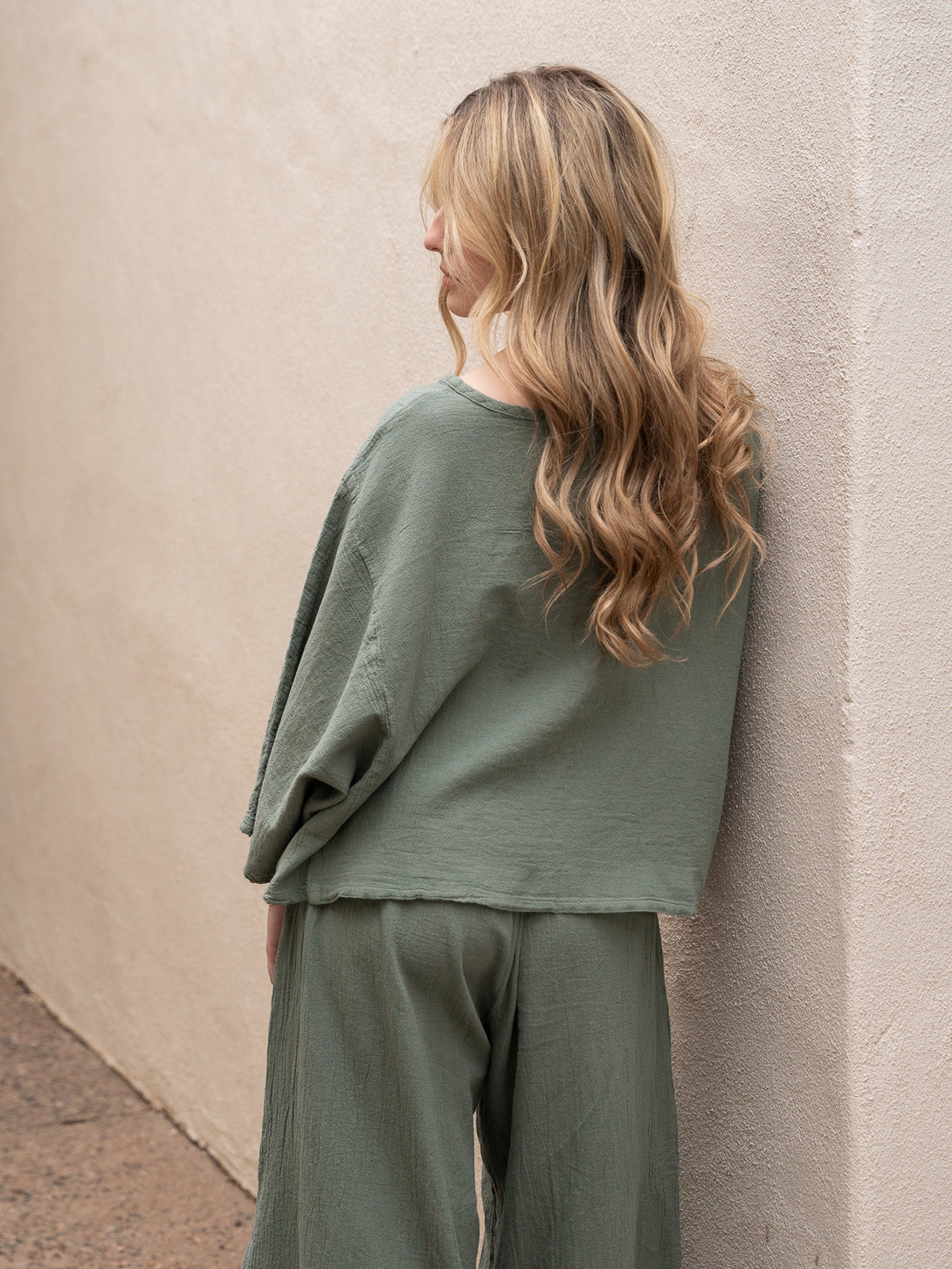 Conscious Coterie Rosie Top in sage cotton on model back view