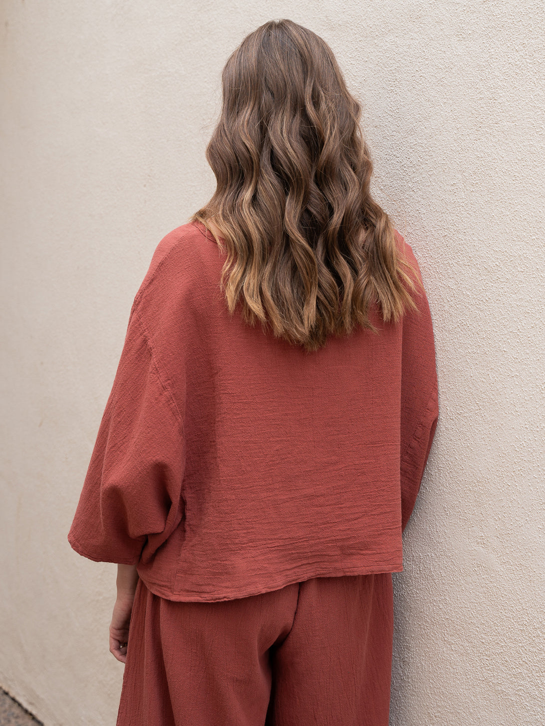 Conscious Coterie Rose Top in terracotta cotton on model back view