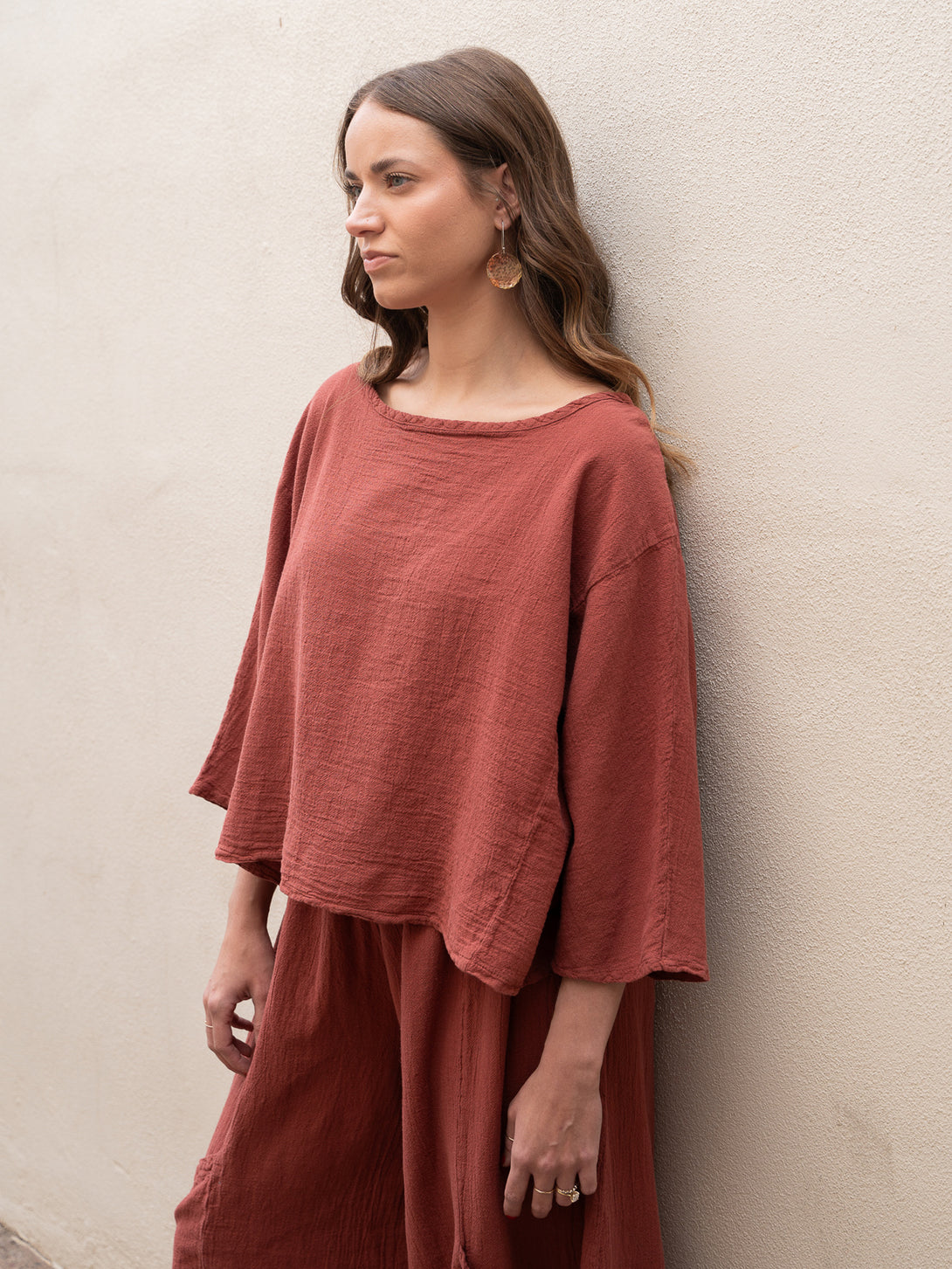 Conscious Coterie Rose Top in terracotta cotton on model front side view