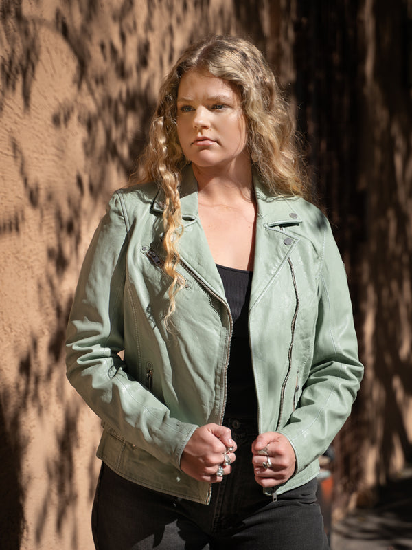 Conscious Coterie Sofia Leather Jacket in frosty green on model looking right editorial image