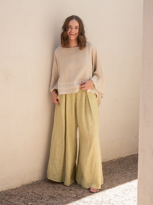 Conscious Coterie Tori Linen Top in Beige on model laughing full front view