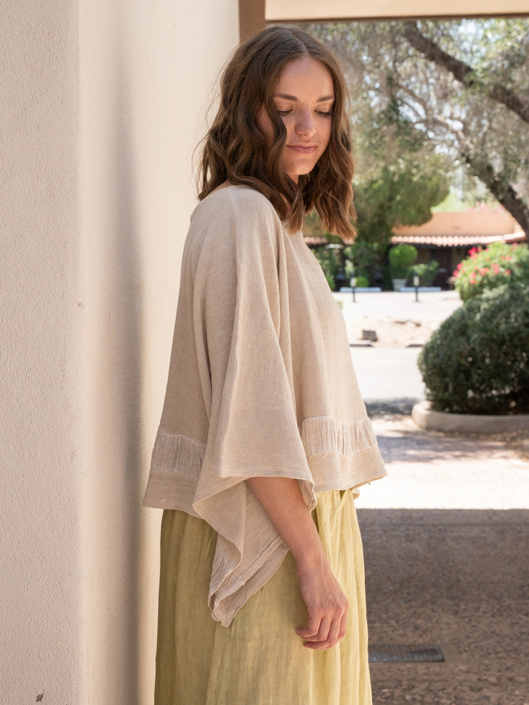 Conscious Coterie Tori Linen Top in Beige on model side view