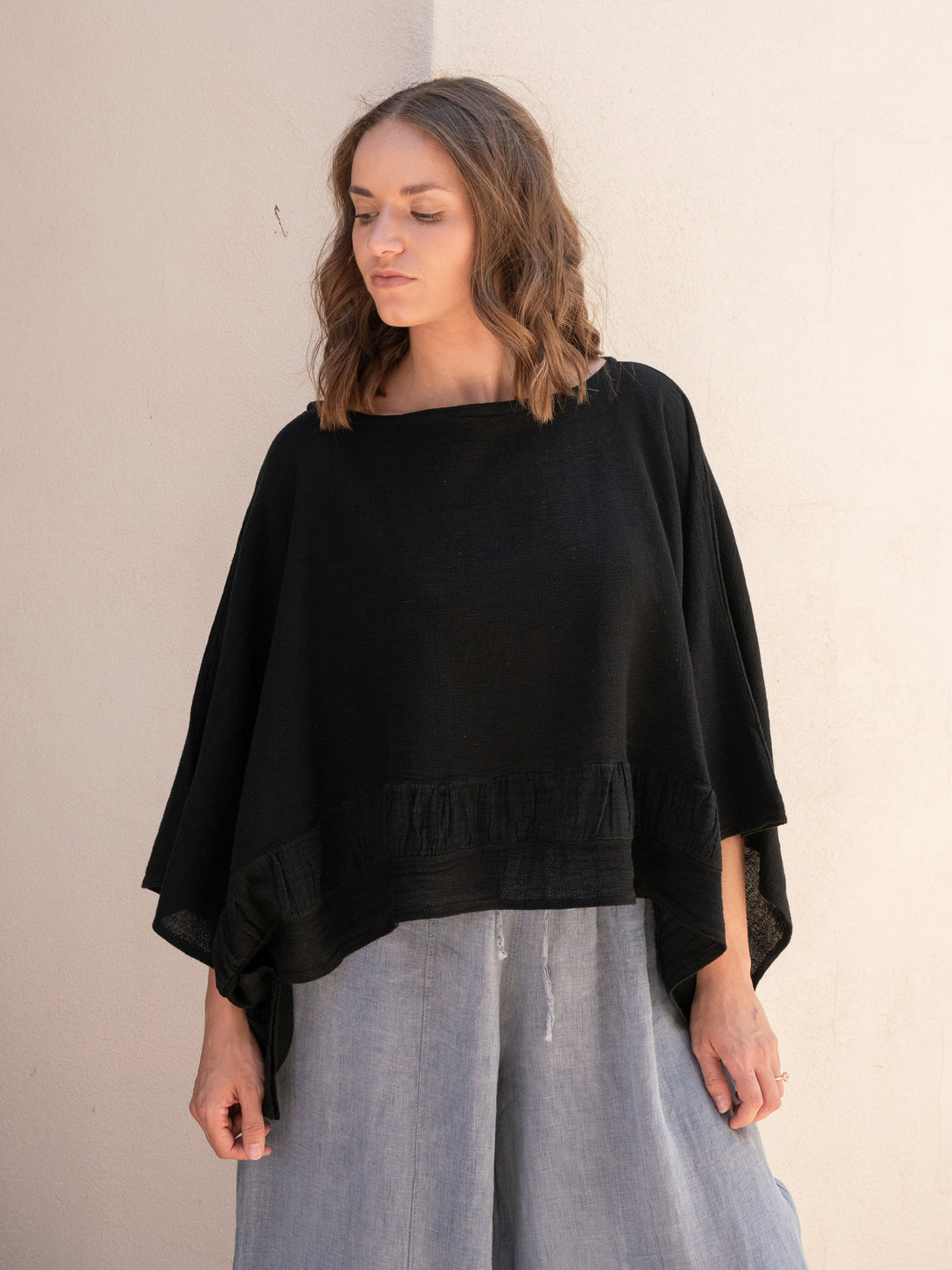 Conscious Coterie Tori Linen Top in Black on model front view