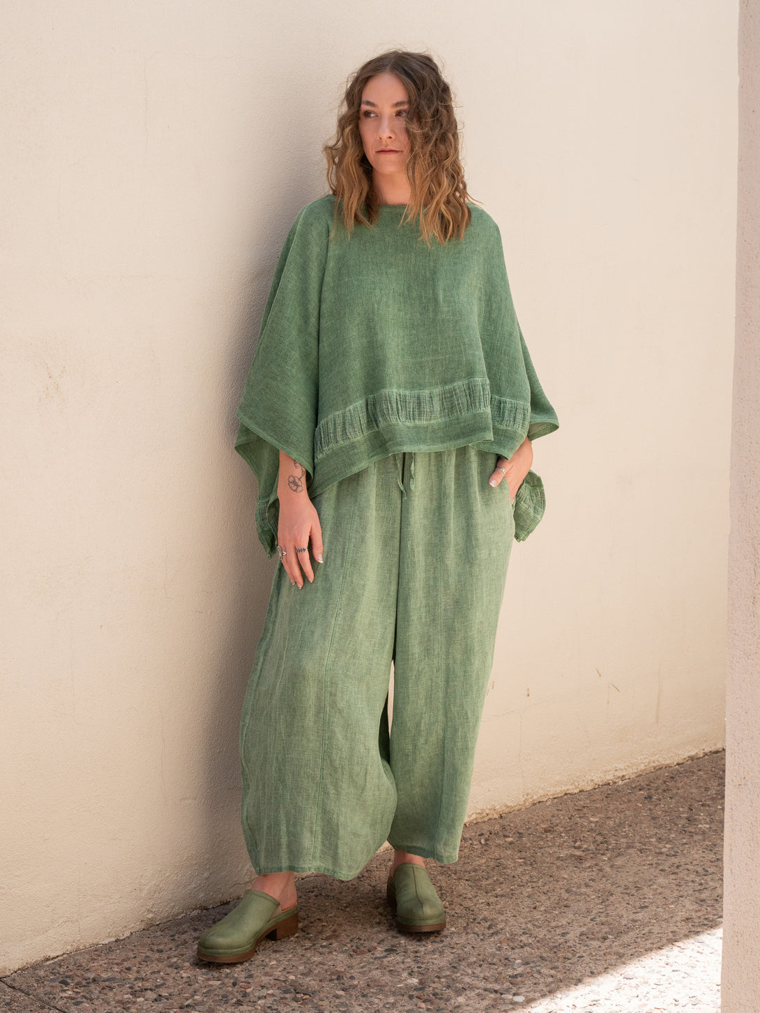 Conscious Coterie Tori Linen Top in Forest Green on model full front view