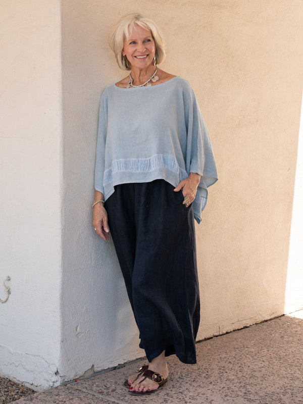 Conscious Coterie Tori Linen Top in Sky Blue on model full front view
