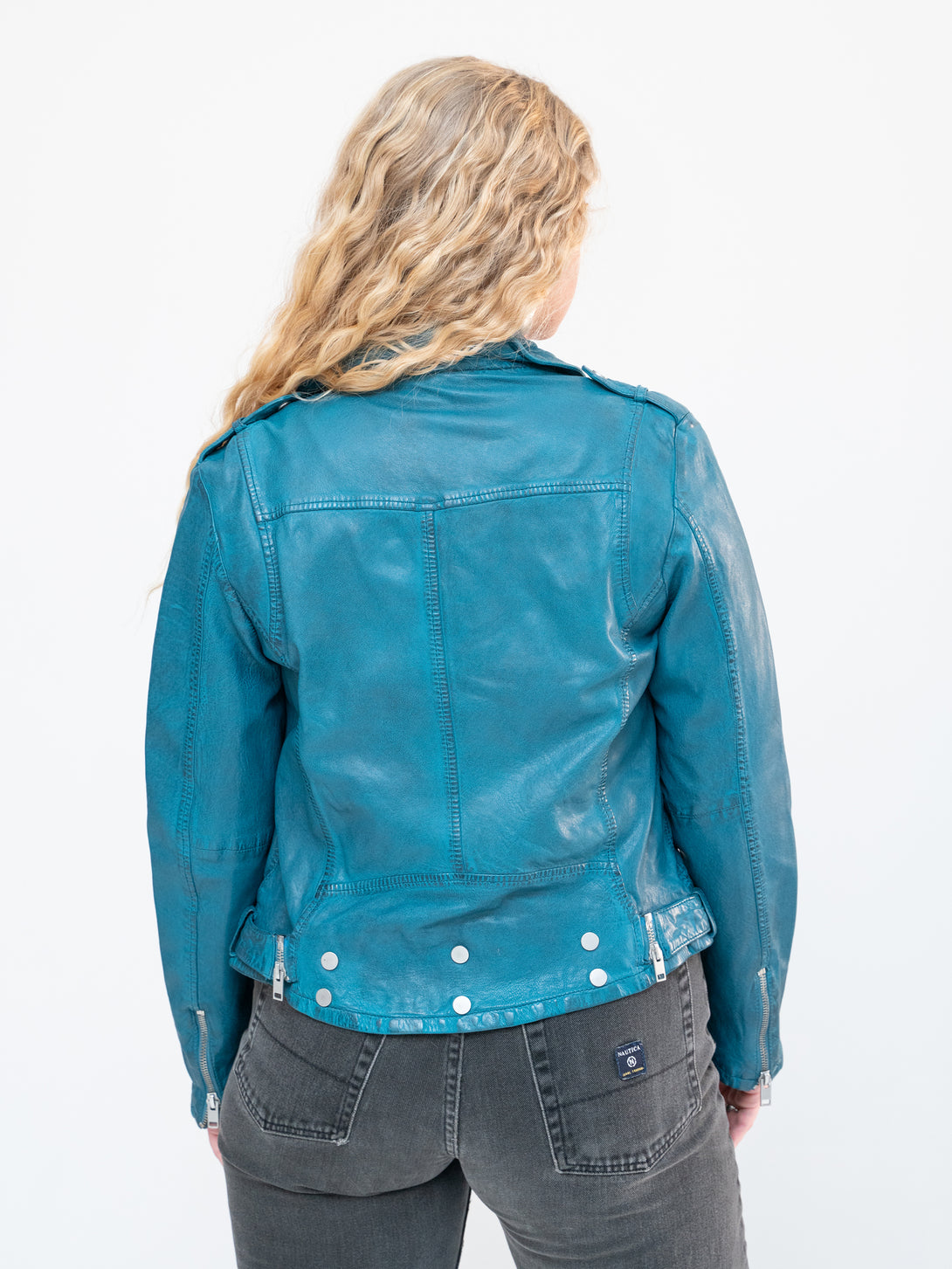 Conscious Coterie Wild Leather Jacket in teal on model back view